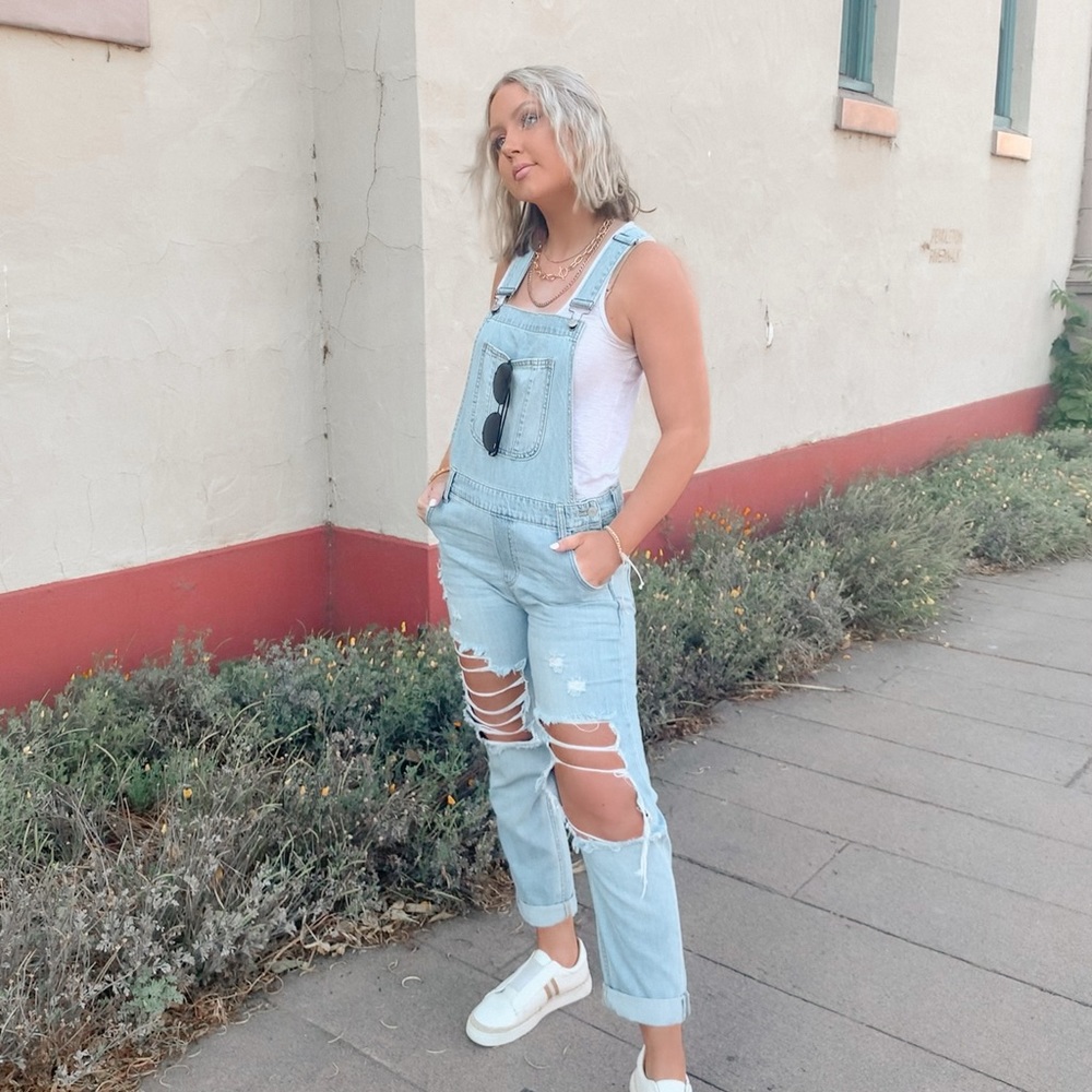 Pink Lily distressed light wash overalls